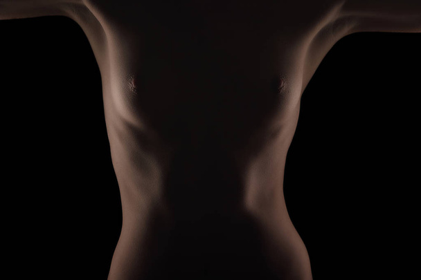 Sexy nude woman torso over black studio background - Zdjęcie, obraz