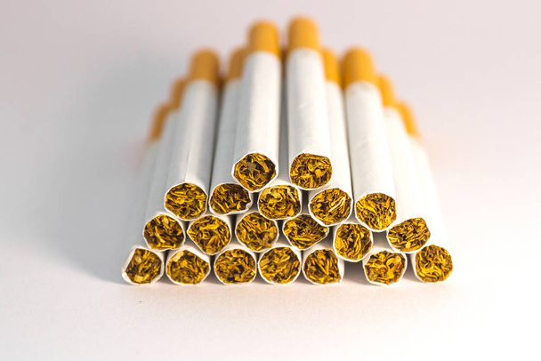 Cigarettes on a white background - Фото, зображення