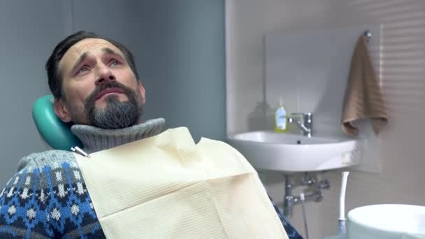 Mature man in dental chair. - Footage, Video