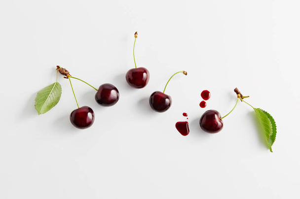 Bunch of fresh cherries with leaves - Photo, image