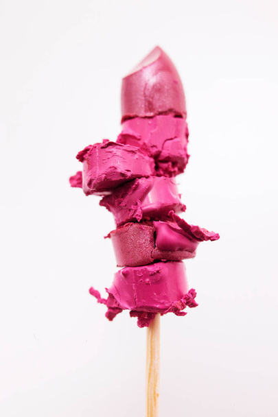 Chopped pink lipstick on stick - Φωτογραφία, εικόνα