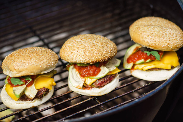 Fresh tasty burgers - Фото, изображение