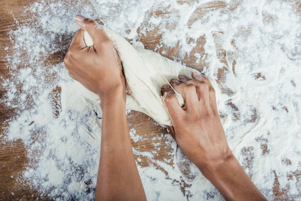 hands kneading dough   - Photo, image