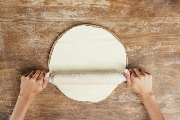 Hands rolling dough  - Photo, Image