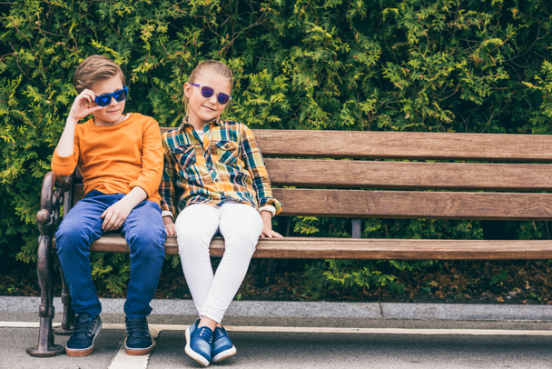 children sitting on bench - Valokuva, kuva