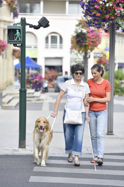 Senior blind woman crossing the street  - Fotografie, Obrázek