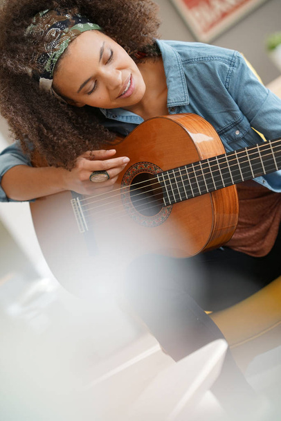 girl playing the guitar - Фото, изображение
