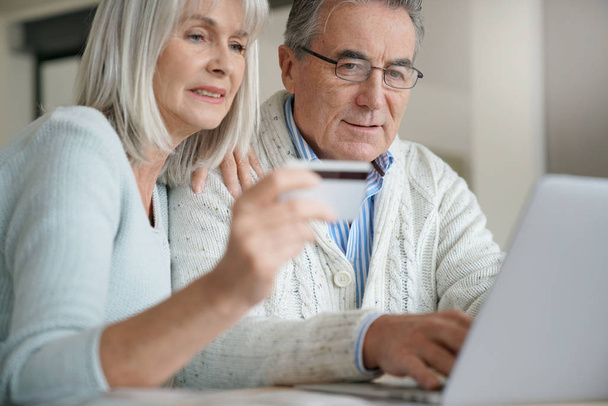 Senior couple buying on internet  - Photo, Image