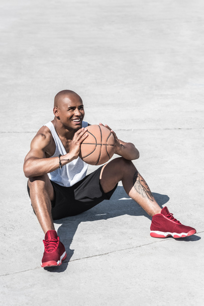 man with basketball ball - Фото, изображение