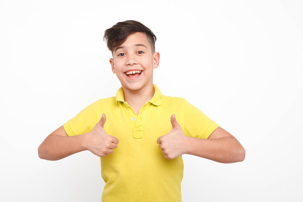 Hasppy boy gesturing thumbs up - Photo, image
