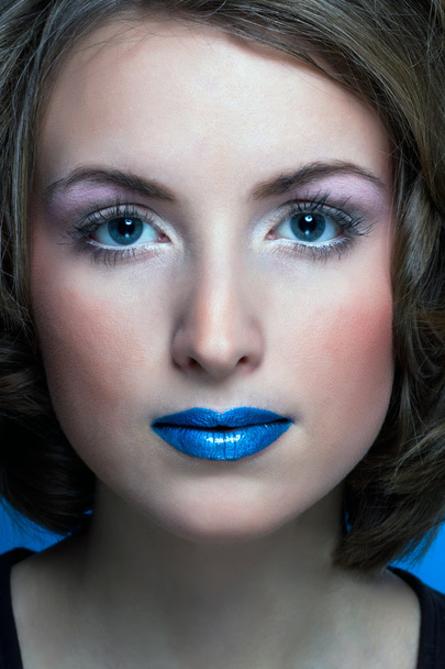 Fashion portrait of woman with blue eyes and lips - Photo, Image