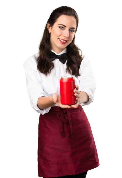 Young beautiful waitress with a can - Photo, Image