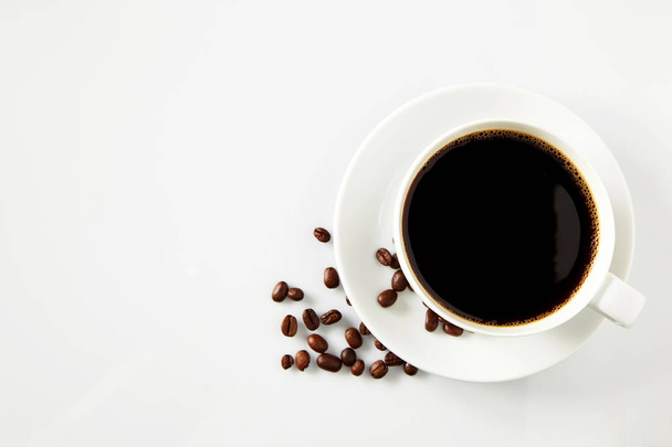 Csésze kávé és kávé bab - Fotó, kép