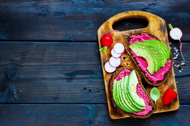 Avocado and beet sandwiches - Photo, Image