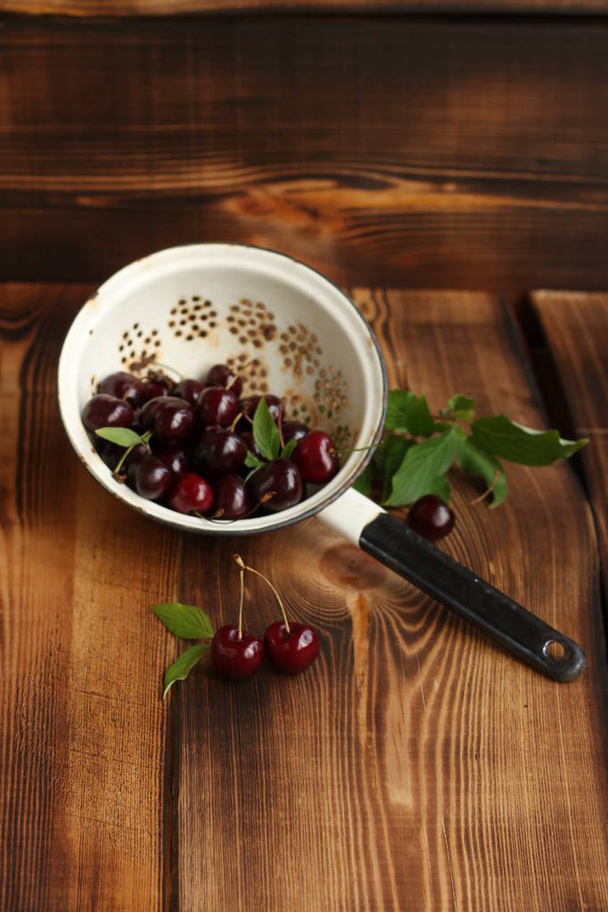 Cherry in a colander  - Photo, Image