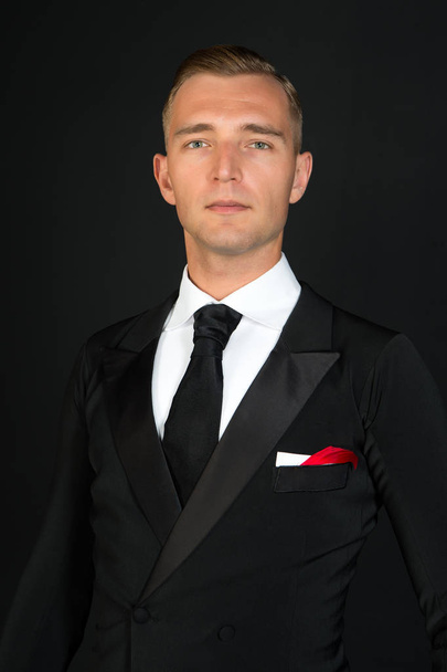 Confident attractive young man in tuxedo - Photo, Image