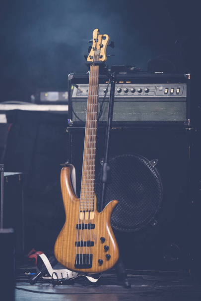 Bass guitar and amplifier - Fotó, kép