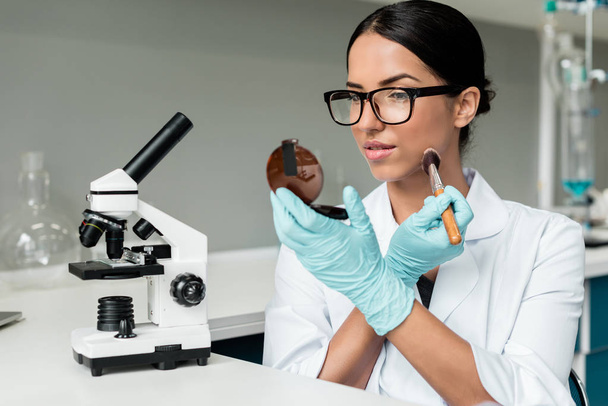 Scientist applying makeup - Photo, Image