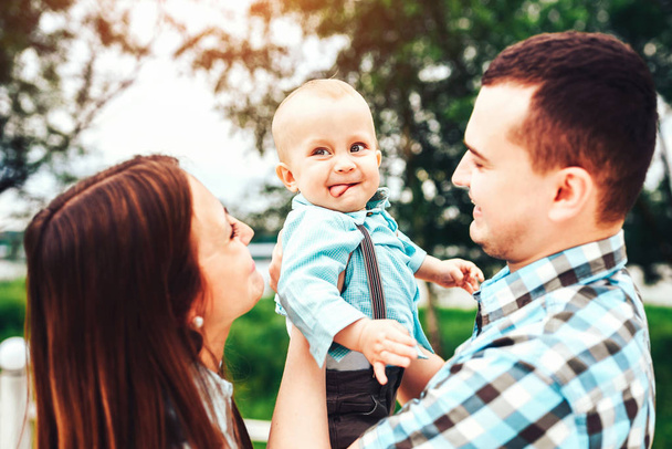 Happy young parents with little son  - Fotoğraf, Görsel