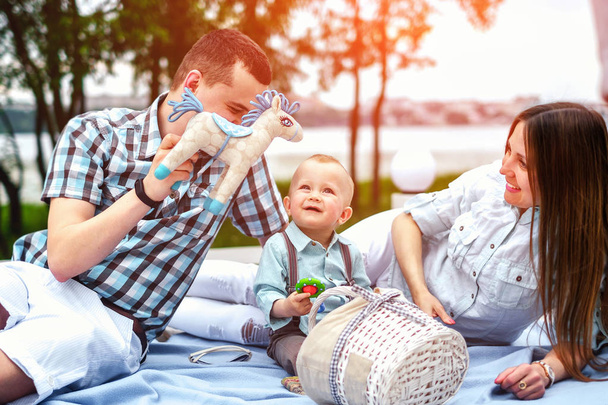 Happy young parents with little son  - Fotoğraf, Görsel