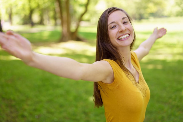 Carefree happy young woman celebrating spring - Foto, Imagen
