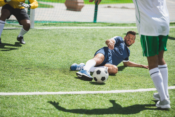 soccer players at pitch - 写真・画像