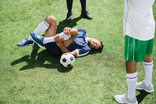 Soccer players at pitch - 写真・画像