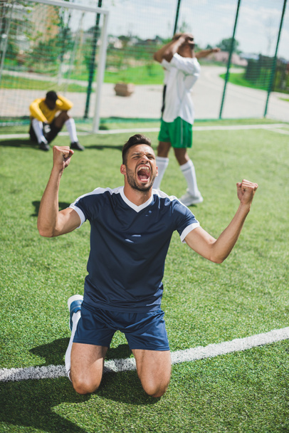 happy soccer player - Valokuva, kuva