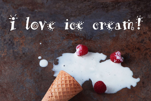 close up of a melting ice cream on brown marble background. With the inscription: I love ice cream - Photo, Image