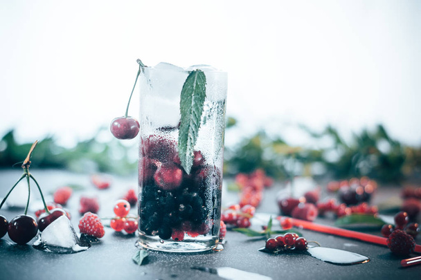 Summer cooling drink with fruit and ice. - Фото, изображение