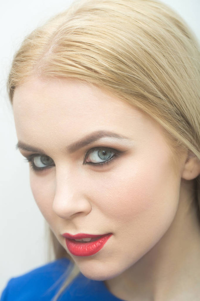 Woman with red lips and professional makeup - Фото, зображення