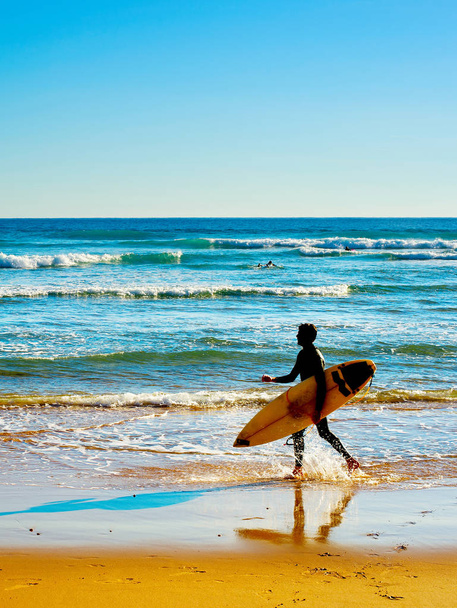 Surfer with surfboard walking - Fotoğraf, Görsel