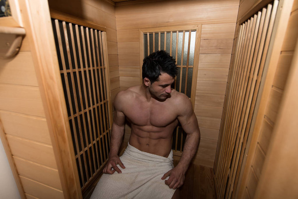 Attractive Man Resting Relaxed In Sauna - Fotografie, Obrázek