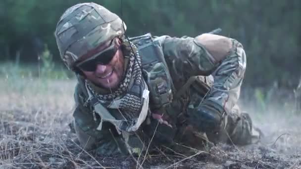 Soldier crawling in field - Footage, Video