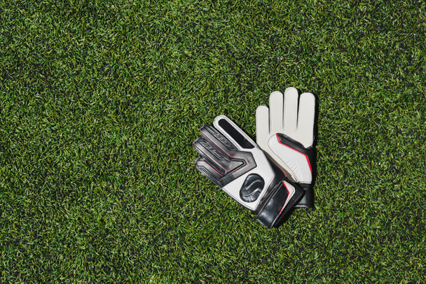 goalkeeper gloves on pitch - Photo, Image