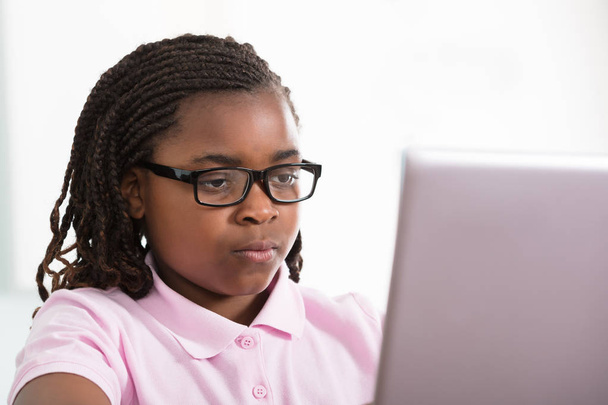 African Girl Looking At Laptop  - Foto, Imagen