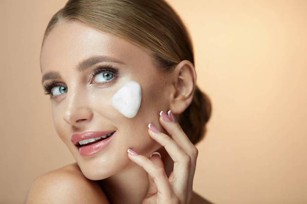 Beauty Skin Cosmetics. Beautiful Young Female With Foam On Face - Fotografie, Obrázek