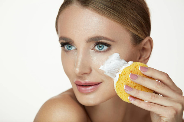 Beauty Face Care. Smiling Woman Cleaning Face With Facial Wash - Zdjęcie, obraz