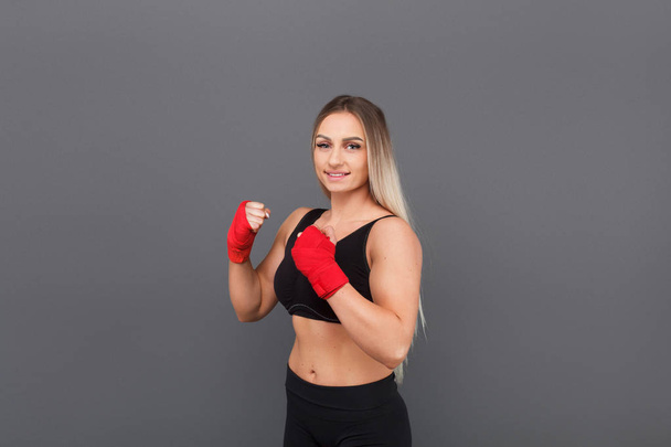 Woman in red boxing gloves - Photo, Image
