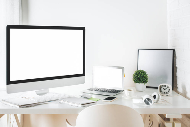 White designer desktop with computer and laptop  - Foto, Bild