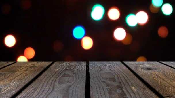 Perspective wood and bokeh background of night and the shimmering glare of the lights. display template item - Footage, Video