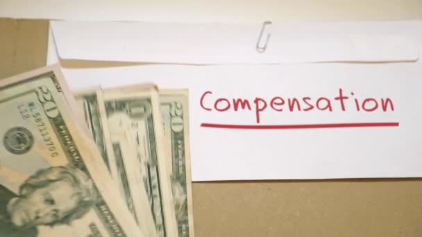 Kompenzace příjmů koncept - Záběry, video