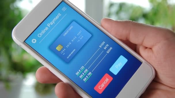 Πληρωμή λογαριασμών με πιστωτική κάρτα χρησιμοποιώντας την εφαρμογή smartphone - Πλάνα, βίντεο