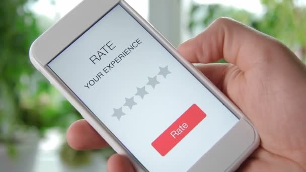 Man gives one star rating using smartphone application - Footage, Video