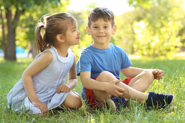 children sitting on grass - Φωτογραφία, εικόνα