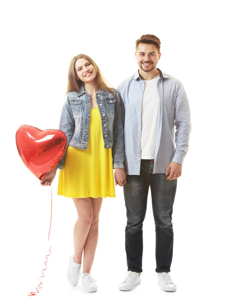 Cute young couple with balloon - Foto, Bild