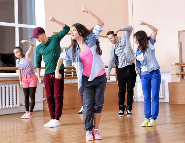 Group of young hip-hop dancers in studio - Valokuva, kuva