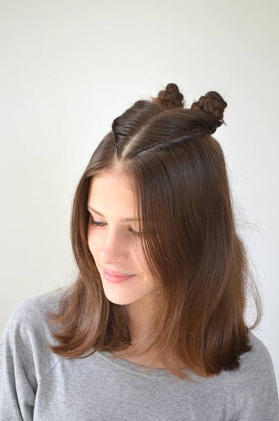 Hairstyle braiding on medium length - Фото, изображение