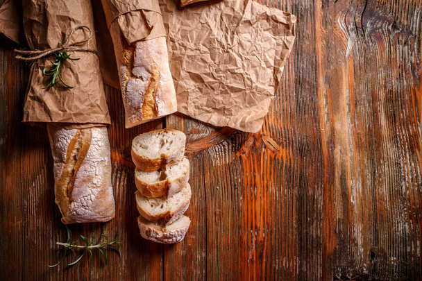 Freshly baked French baguettes - Фото, зображення