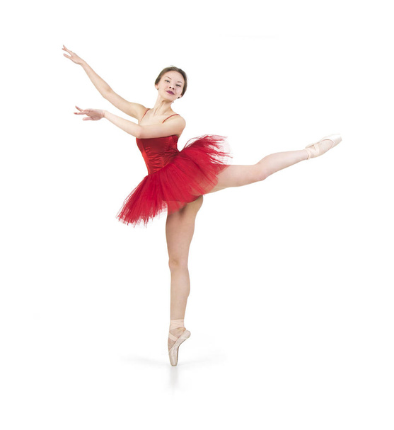 Ballerina in a red tutu. - Foto, afbeelding